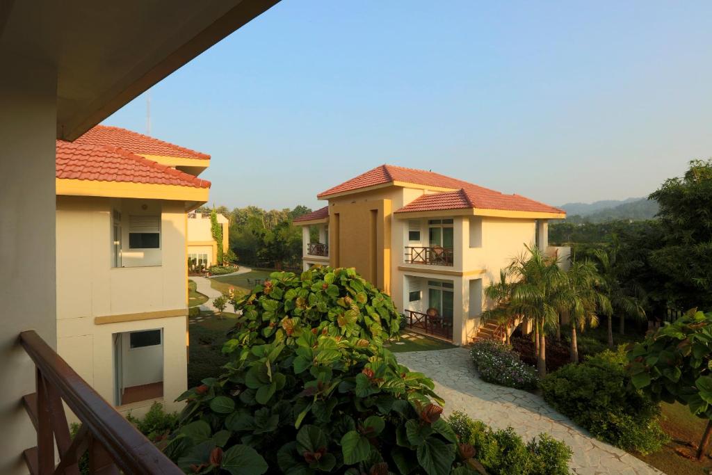 a view from a balcony of a house at Resort De Coracao - Corbett , Uttarakhand in Rāmnagar