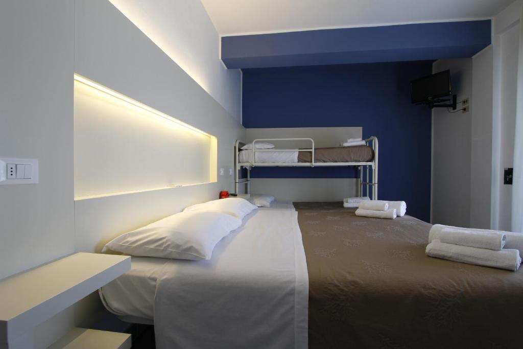 Postel nebo postele na pokoji v ubytování Hotel Desire'