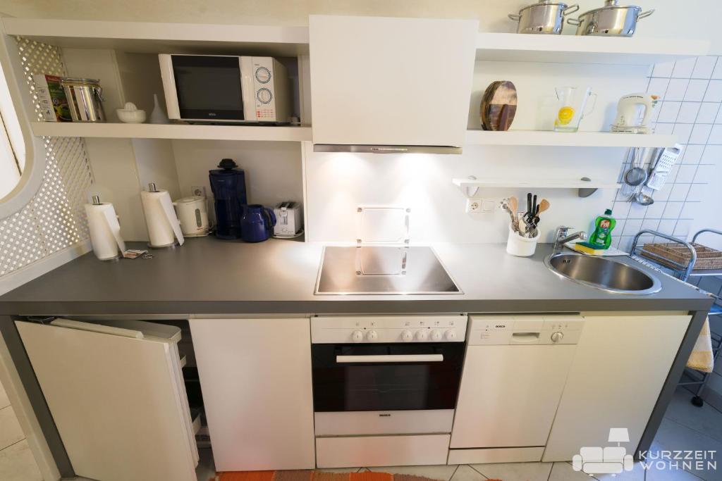 A kitchen or kitchenette at Appartements Steingasse