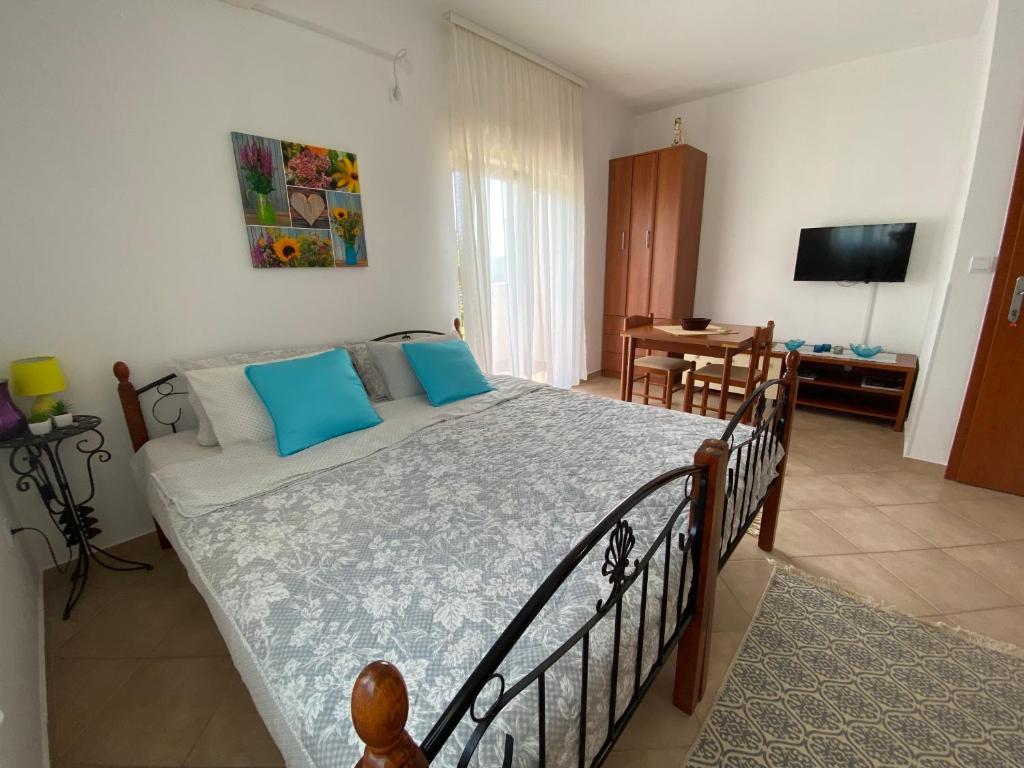 Postel nebo postele na pokoji v ubytování Apartments Villa Andjela