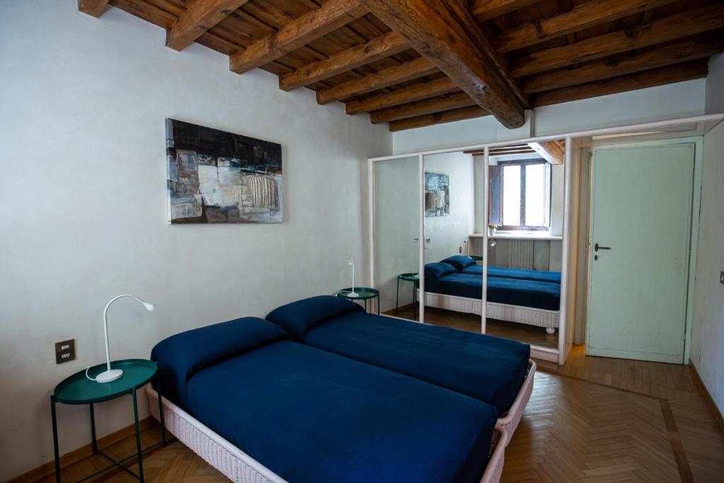 Posteľ alebo postele v izbe v ubytovaní Torre dei Sapiti Apartment