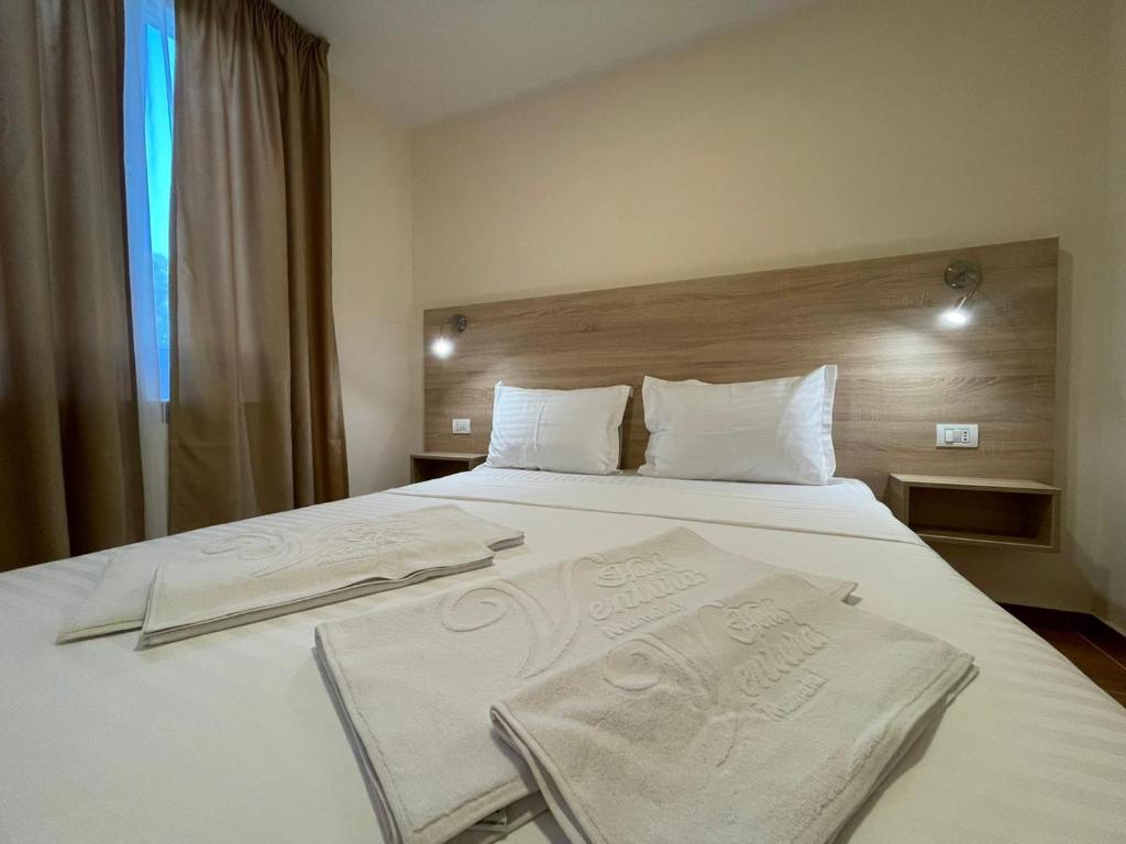 Postel nebo postele na pokoji v ubytování Hotel Olt by Ventura