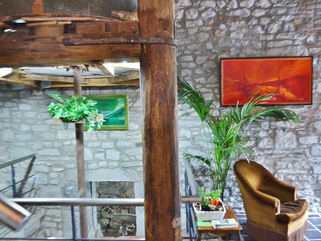 Posezení v ubytování Hotel Le Moulin Des Ramiers