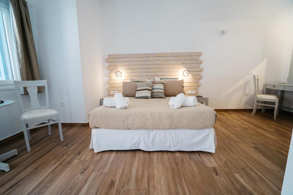 Posteľ alebo postele v izbe v ubytovaní Grand View
