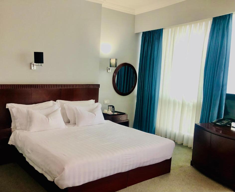 Postel nebo postele na pokoji v ubytování Hotel Aisi