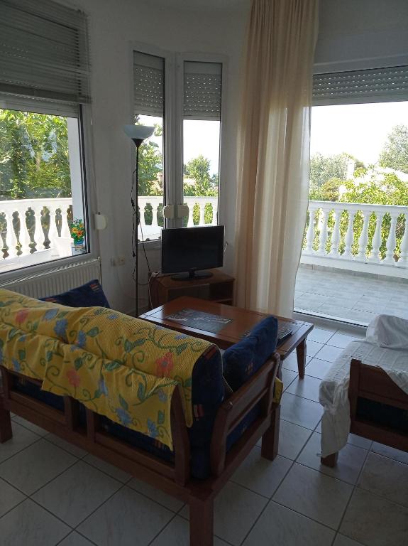 Postel nebo postele na pokoji v ubytování Europa Apartments Stefanos