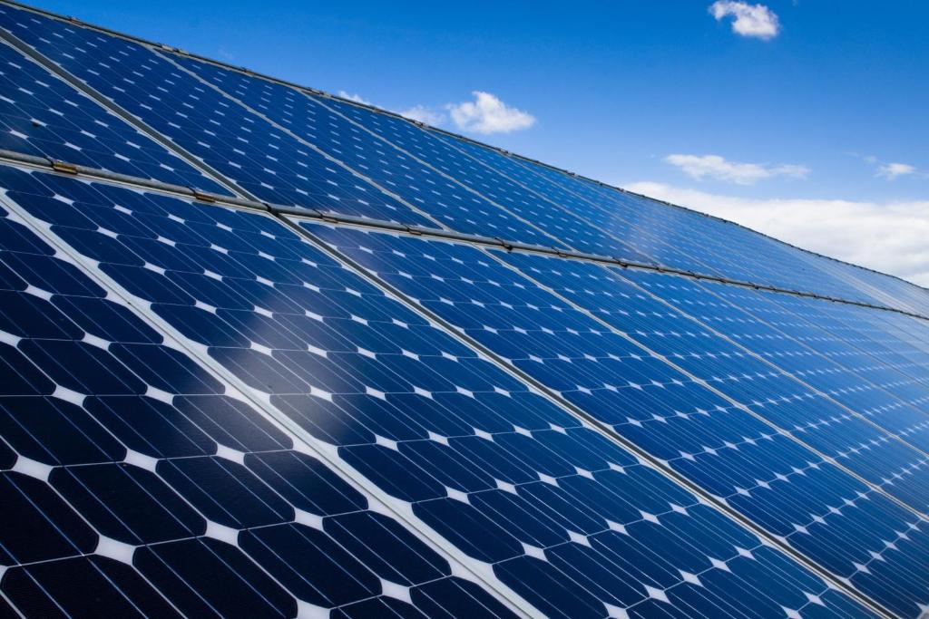 a blue roof of a building with solar panels at HOTEL CASADEI in Rimini