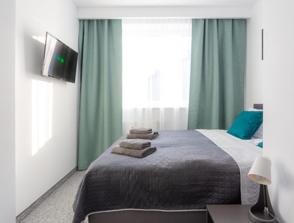 Postel nebo postele na pokoji v ubytování VILLA TO-TU