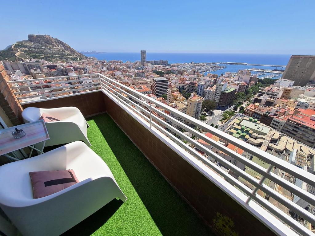 a balcony with a view of a city at Mirador 22 in Alicante