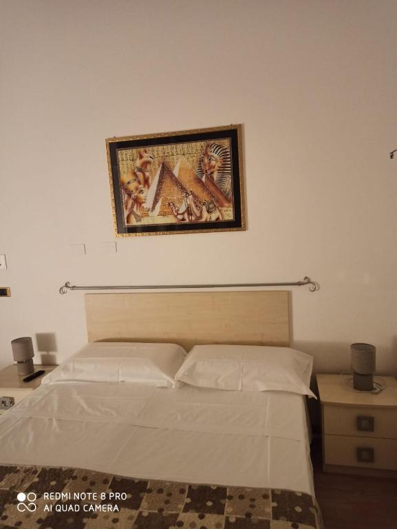Postel nebo postele na pokoji v ubytování Rooms Center Wolf - Matrimoniale e Comunicanti
