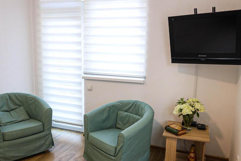 TV a/nebo společenská místnost v ubytování Modesty Zlatar