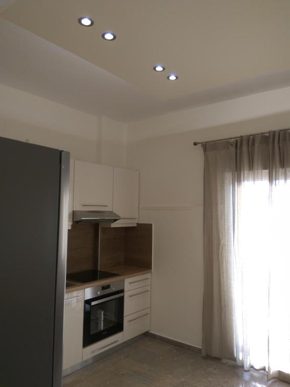 Kuchyňa alebo kuchynka v ubytovaní NAFPAKTOS Beach luxury Suites