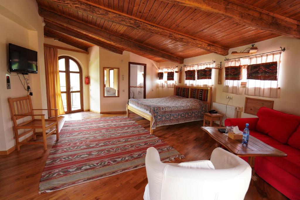 Postel nebo postele na pokoji v ubytování Hotel Mirhav