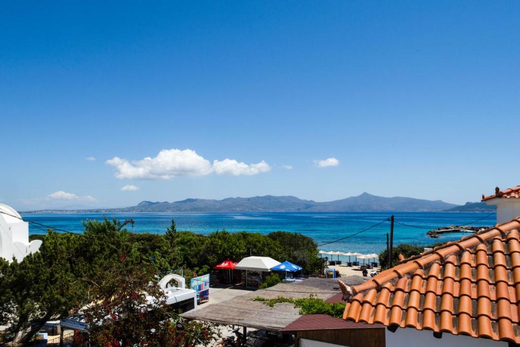 a view of the ocean from a building at Saronis Hotel Agistri - Adults Only in Skala