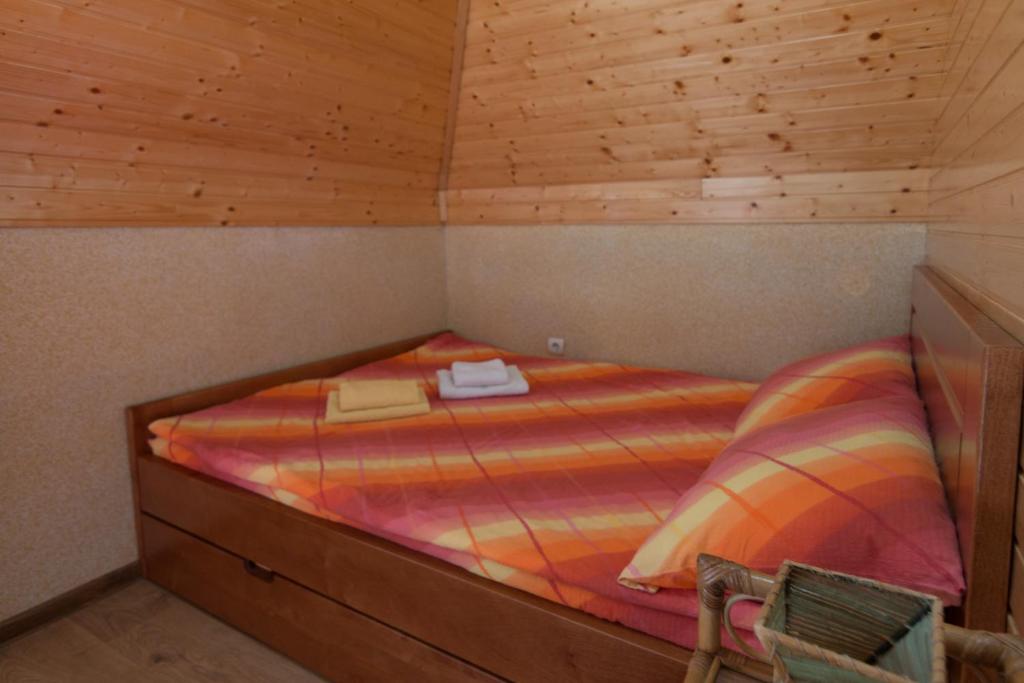 Llit o llits en una habitació de Zavičaj Apartmani3