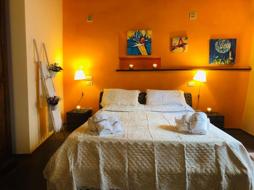 Postel nebo postele na pokoji v ubytování Bed & Breakfast Montepulciano