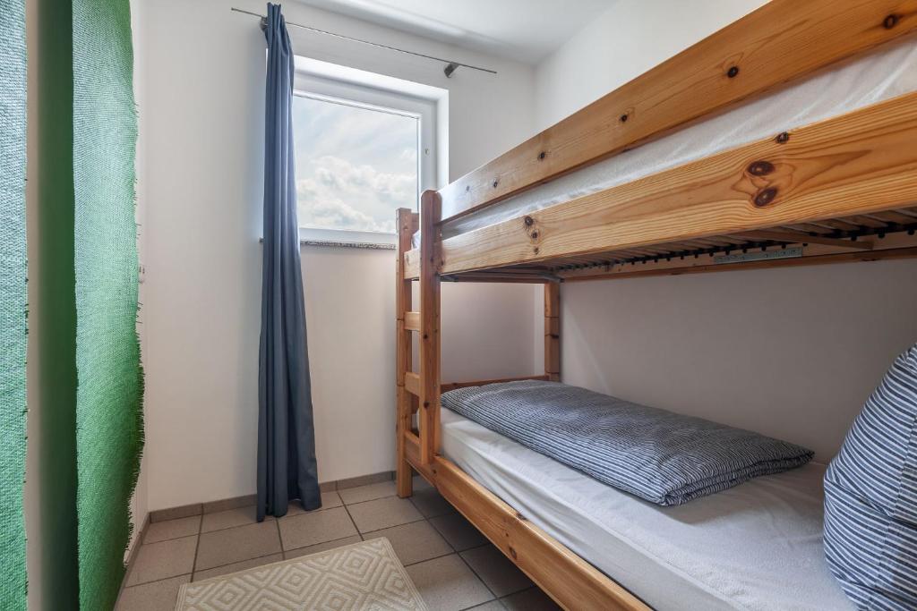 Postel nebo postele na pokoji v ubytování Ols Berghaus