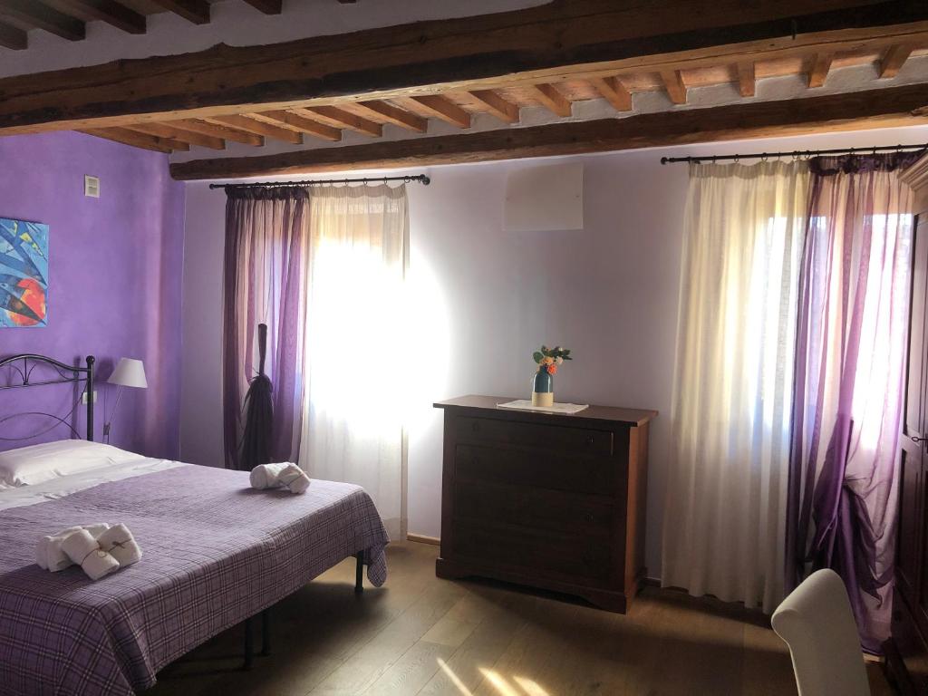Postel nebo postele na pokoji v ubytování Bed & Breakfast Montepulciano