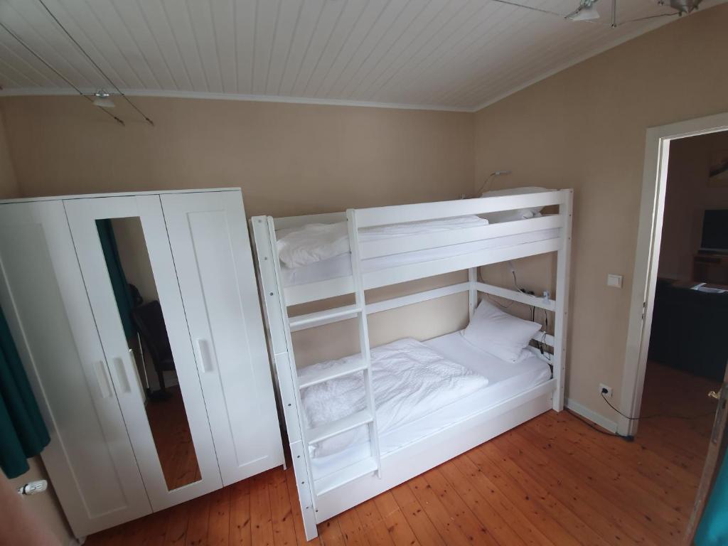 Postel nebo postele na pokoji v ubytování Hotel Garni Lindenmühle