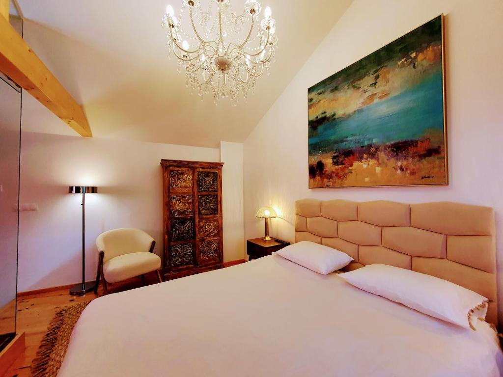 En eller flere senge i et værelse på Casa dos Jasmins by Lisbon Village Apartments