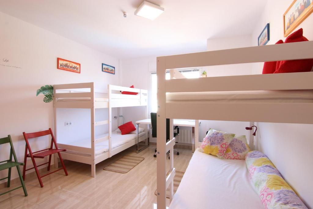 A bed or beds in a room at Stay U-nique Villa Portimar