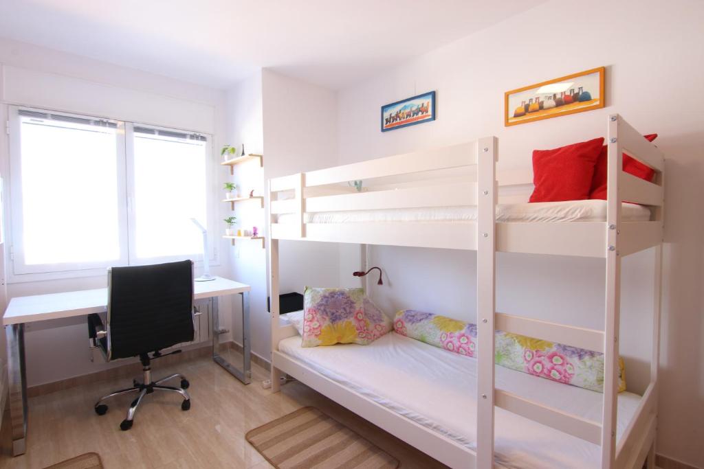 A bed or beds in a room at Stay U-nique Villa Portimar