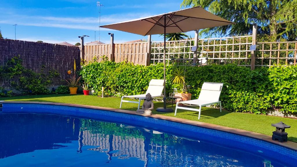 The swimming pool at or close to Stay U-nique Villa Portimar