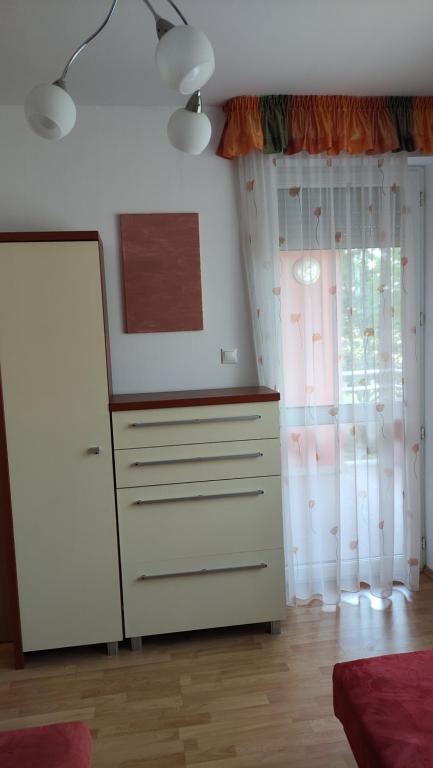 Posteľ alebo postele v izbe v ubytovaní Mona apartment