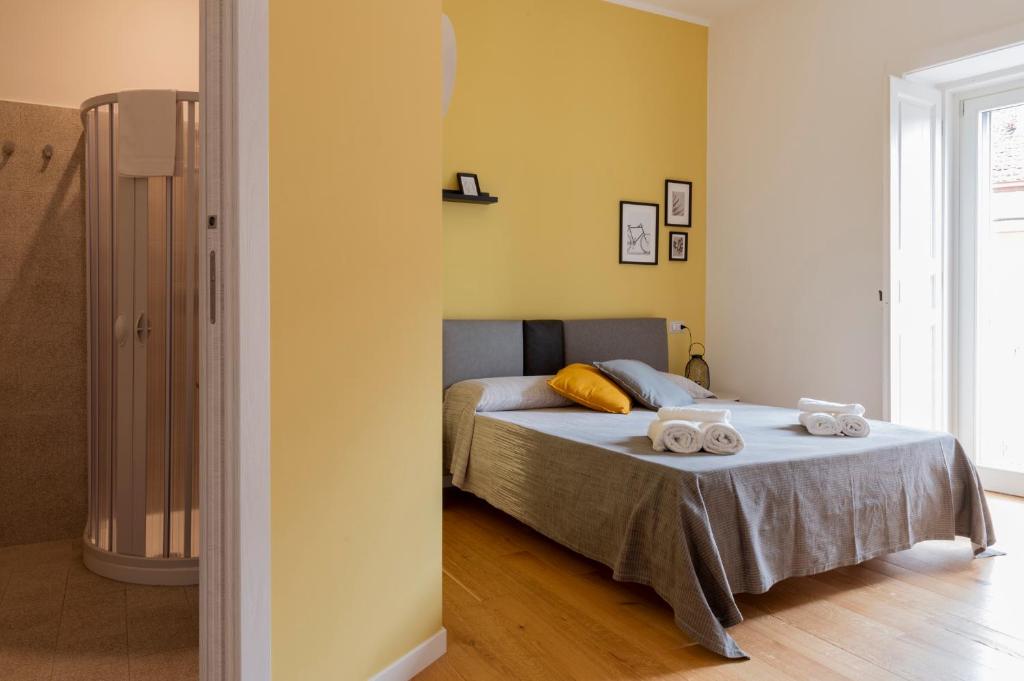 A bed or beds in a room at Mastu Gilardo