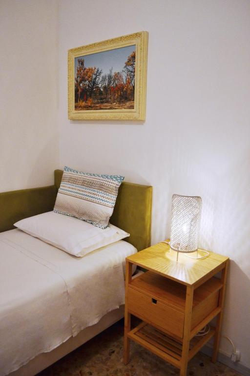 Postel nebo postele na pokoji v ubytování Da Virginia B&B