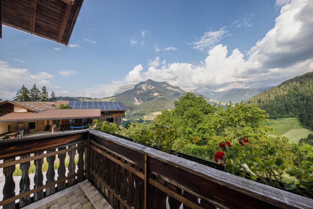 a balcony with a view of a mountain at Grödnerhof Heidi in Brie