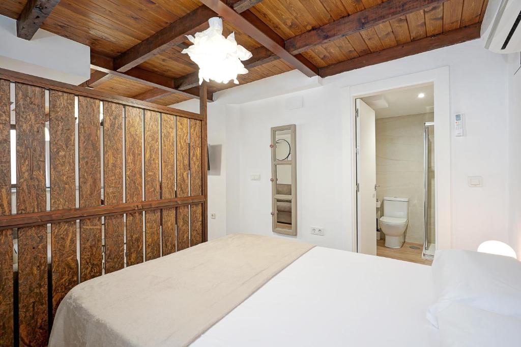 Posteľ alebo postele v izbe v ubytovaní Tina Home