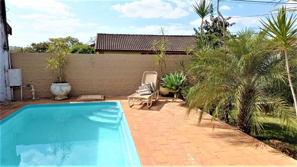 Bazén v ubytování CASA DE CAMPO PATRIMÔNIO nebo v jeho okolí