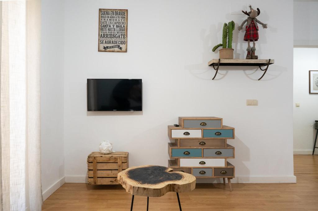 Televízia a/alebo spoločenská miestnosť v ubytovaní Tina Home