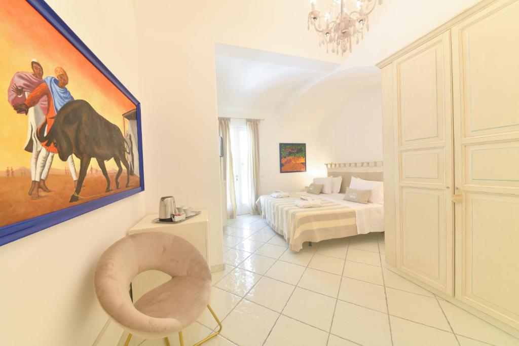 Ένα ή περισσότερα κρεβάτια σε δωμάτιο στο Queen Suite - Luxury Rooms