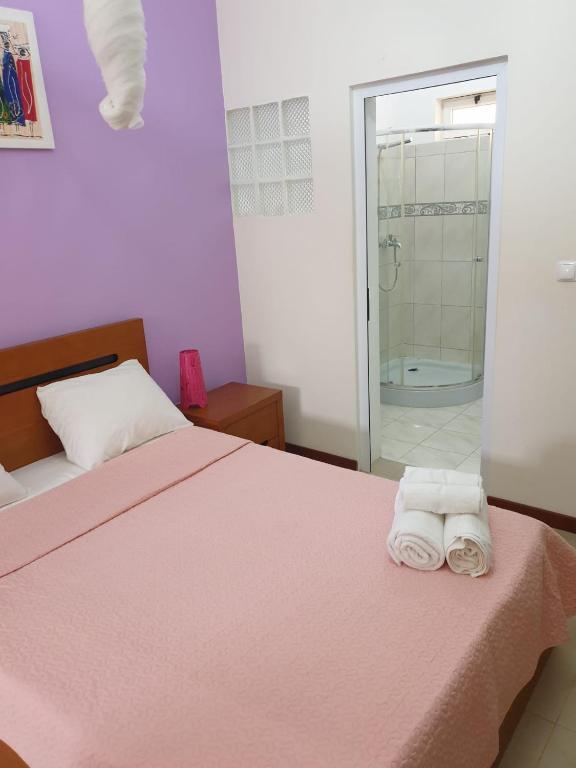 Postel nebo postele na pokoji v ubytování Cactus Guest House