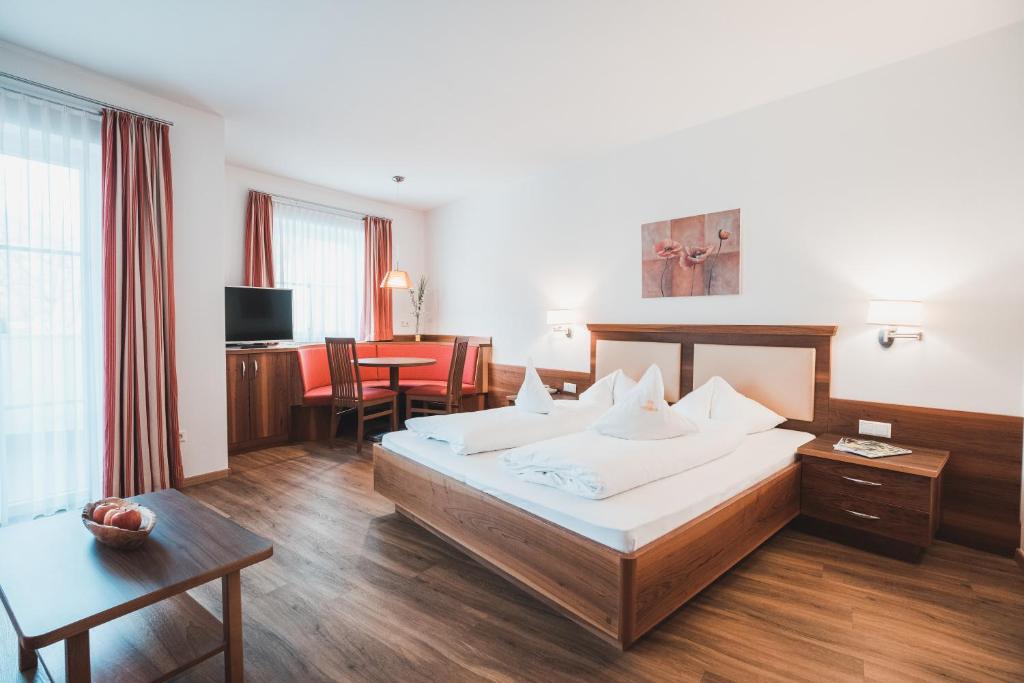 Postel nebo postele na pokoji v ubytování Hotel Am Sonneck