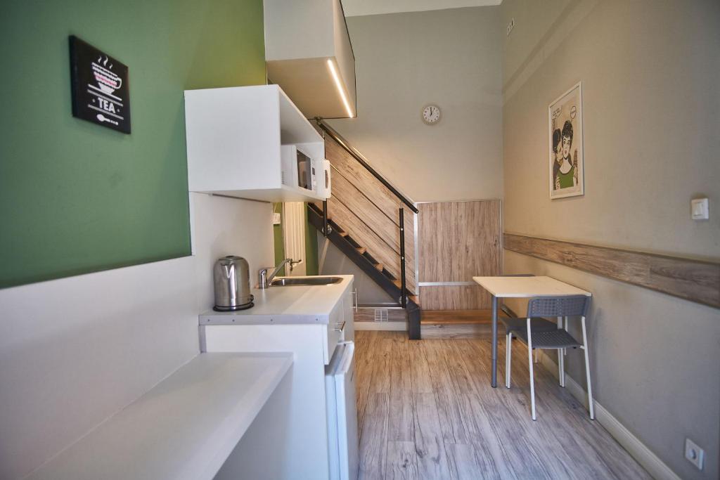 Kuchyňa alebo kuchynka v ubytovaní Z40 Apartments - hostAID