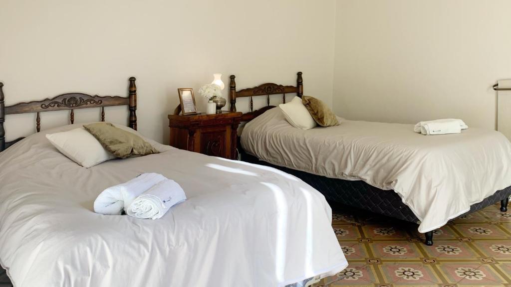 Postel nebo postele na pokoji v ubytování Alem Colonial - Mendoza