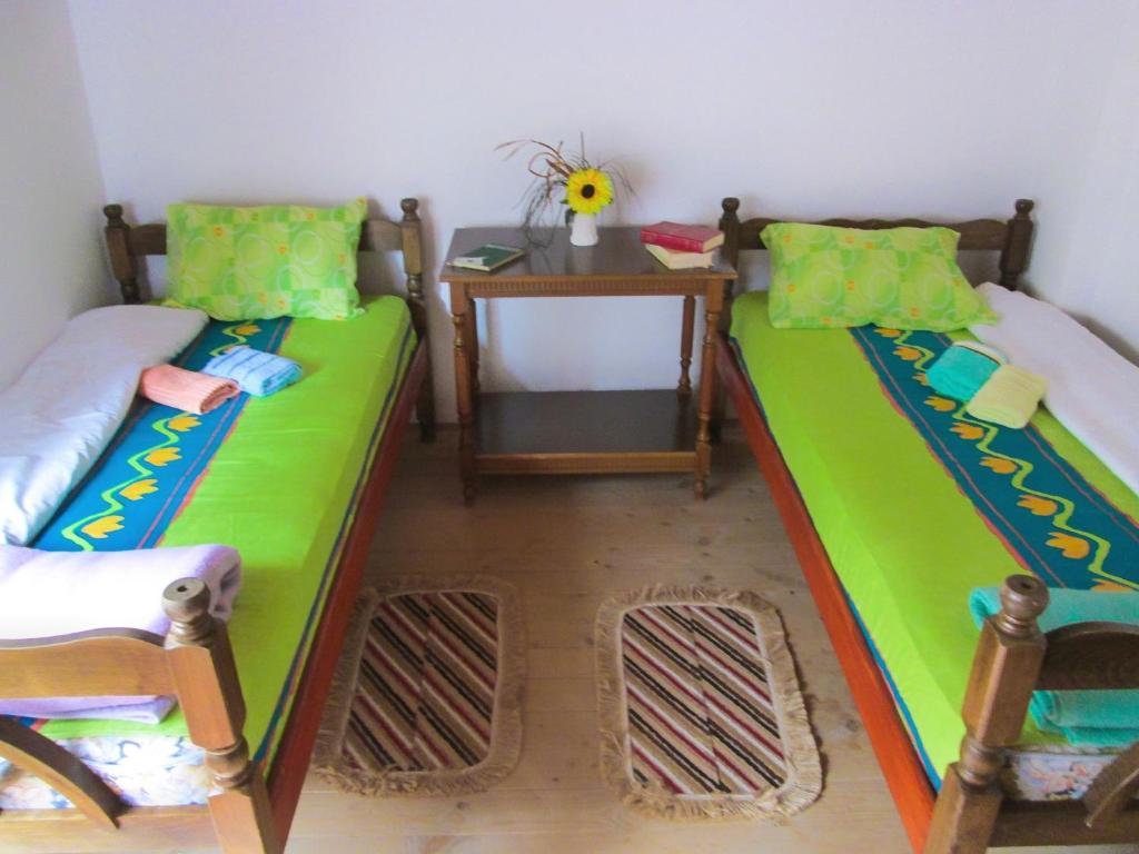 Postel nebo postele na pokoji v ubytování Guesthouse Mirkovic