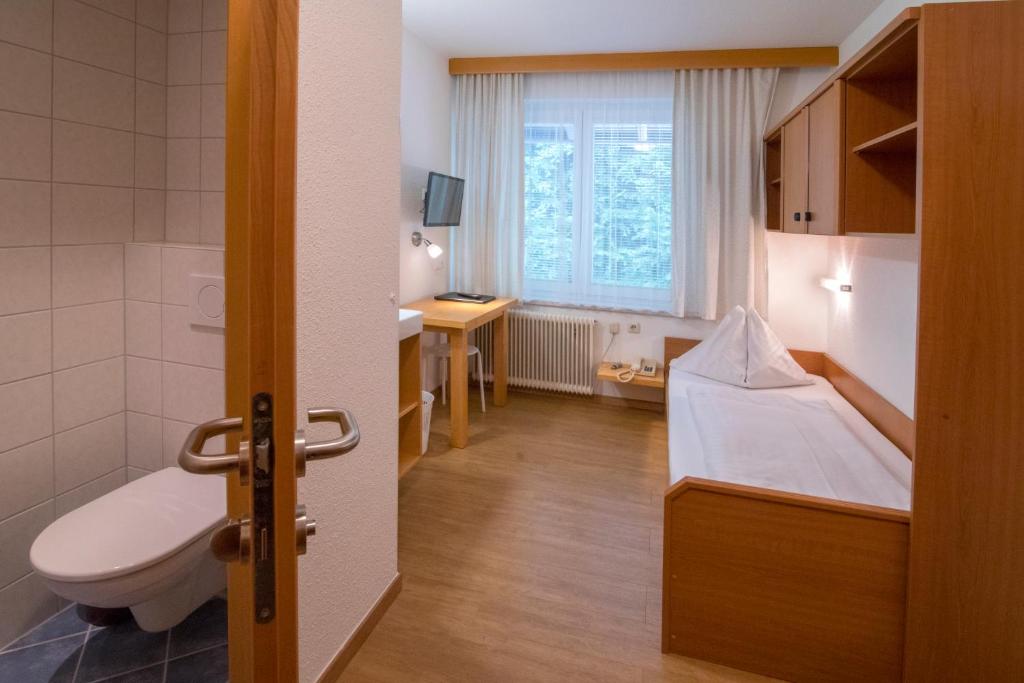 Postel nebo postele na pokoji v ubytování Hotel Gabriel