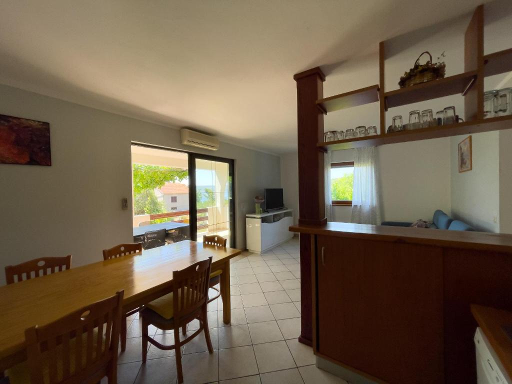 Kuchyň nebo kuchyňský kout v ubytování Apartments Ana