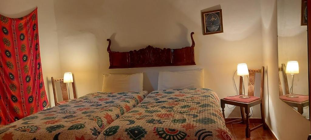 Postel nebo postele na pokoji v ubytování Casa Joya