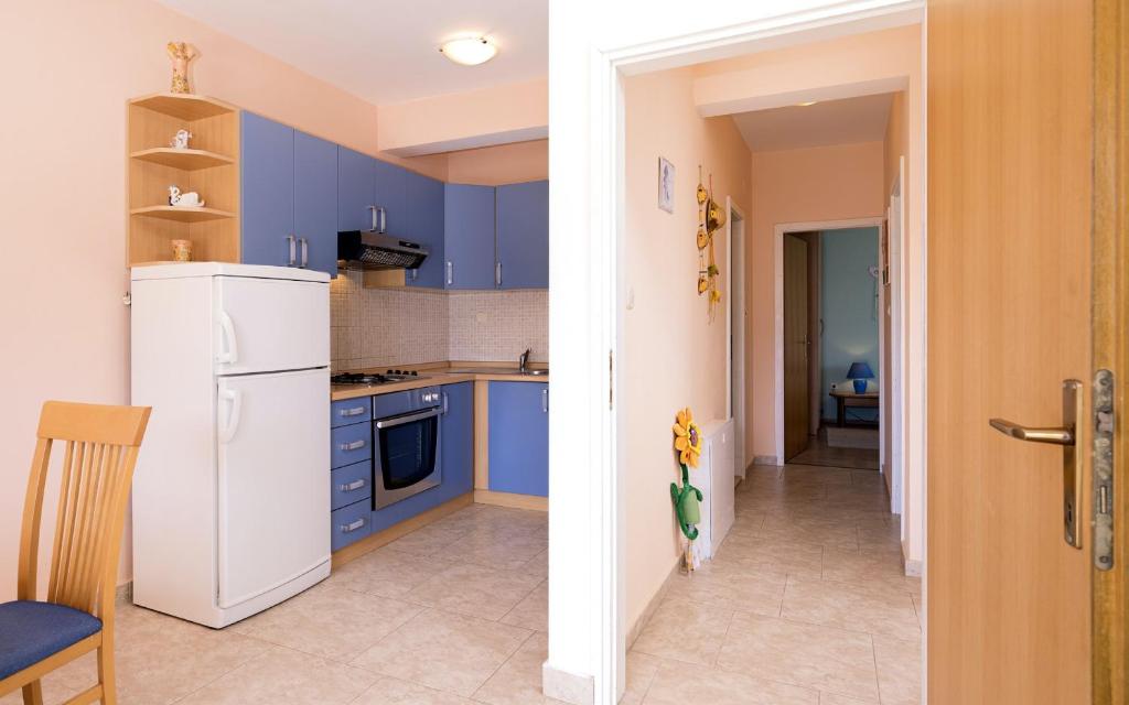 Kuchyň nebo kuchyňský kout v ubytování Apartments Zlata