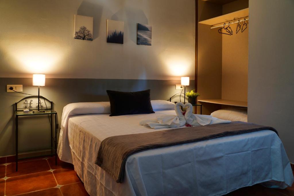Krevet ili kreveti u jedinici u okviru objekta Hotel Rural & Restaurante Las Camaretas