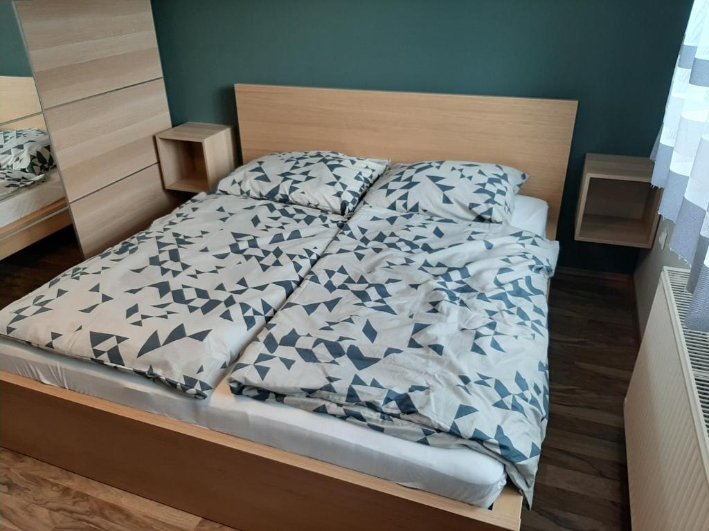 Postel nebo postele na pokoji v ubytování Zoli Vendégház