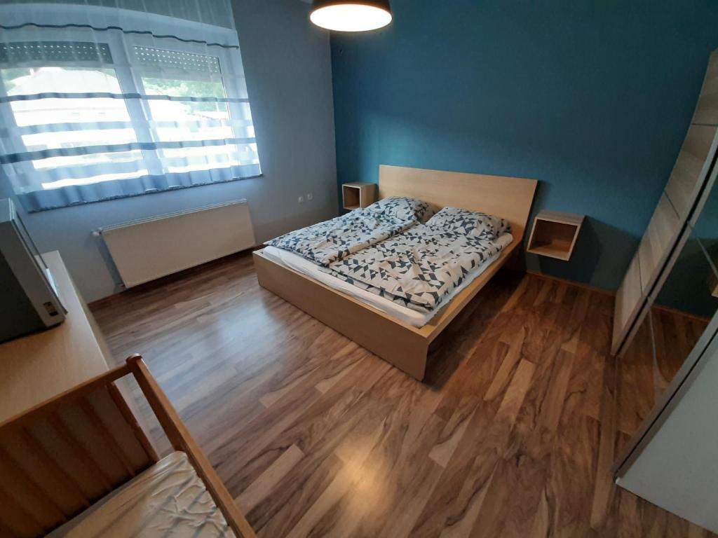 Postel nebo postele na pokoji v ubytování Zoli Vendégház