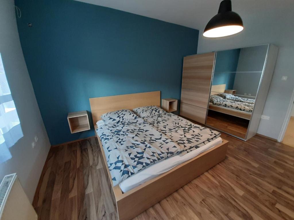 Postel nebo postele na pokoji v ubytování Zoli Vendégház