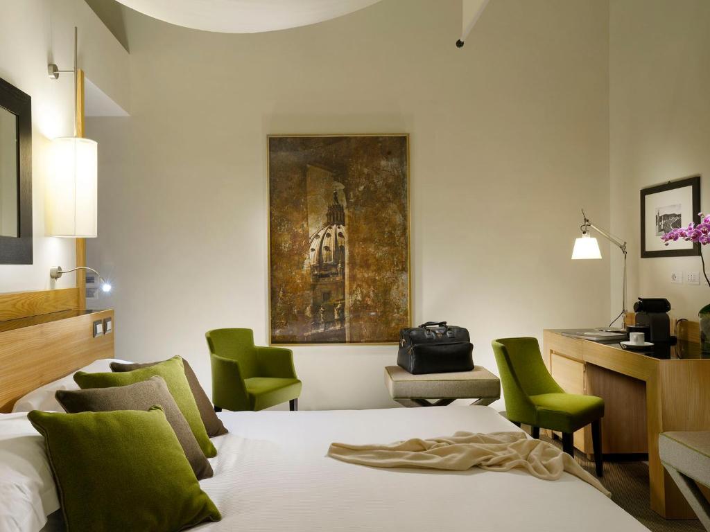 A bed or beds in a room at Babuino 181 - Small Luxury Hotels of the World