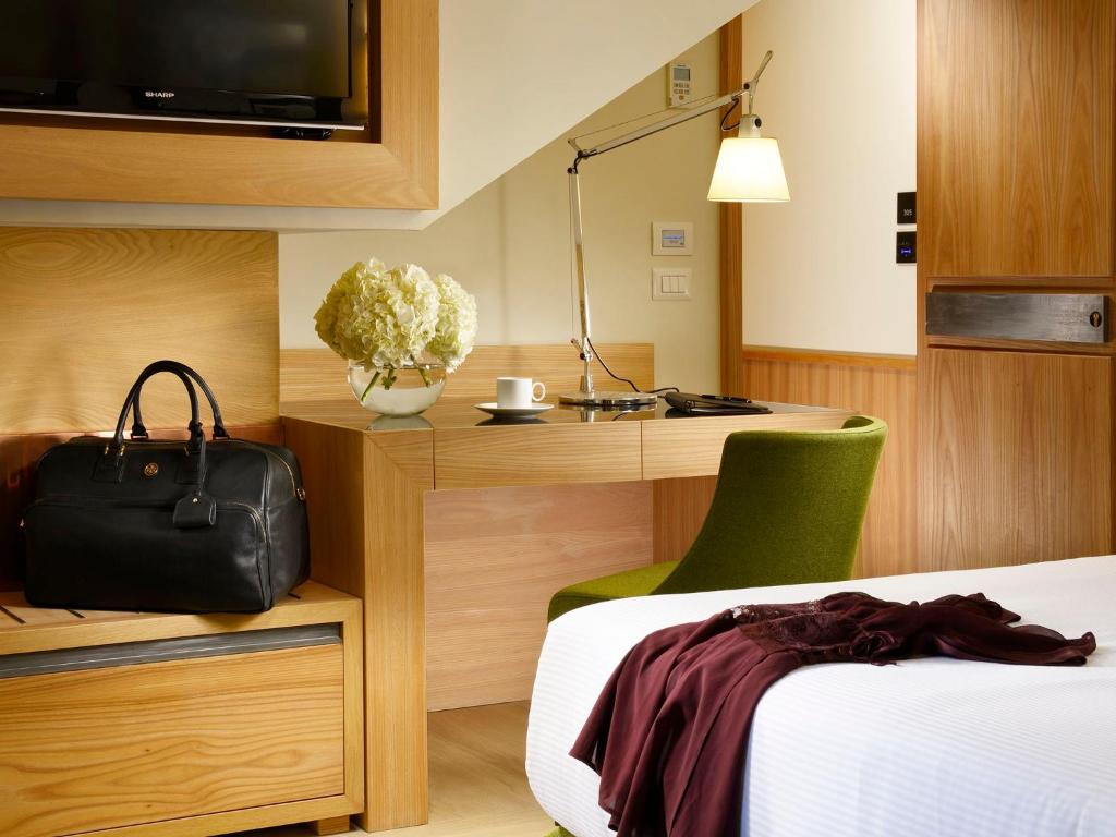 A bed or beds in a room at Babuino 181 - Small Luxury Hotels of the World